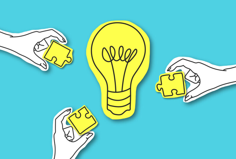Teamwork, creative society, platform. Hands with puzze peaces around yellow light bulb over blue background